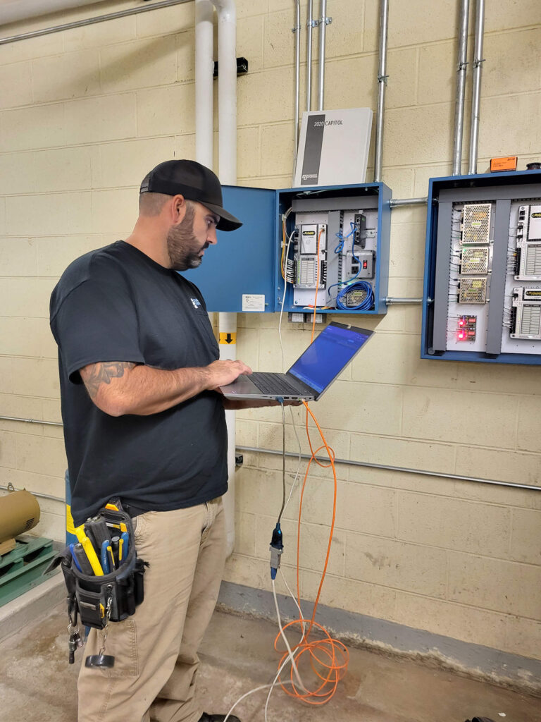 a building automation system technician working on preventative maintenance for the Diocese of Cheyenne building